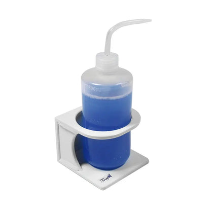 TrippNT 50569 — in-use view with 500mL wash bottle secured on fume hood wall