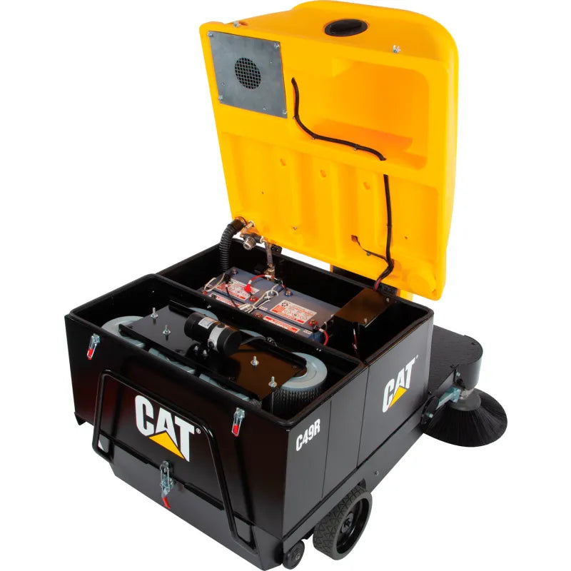 Cat® C49R Ride-On Sweeper — operator seat, controls, cup holder, and USB charger