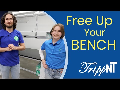 TrippNT 54000 — GMP manufacturing bench context, under metal shelf at high-throughput wipe station
