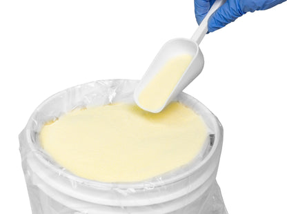 Heathrow Scientific sampling scoop drawing granular sample from a lined drum