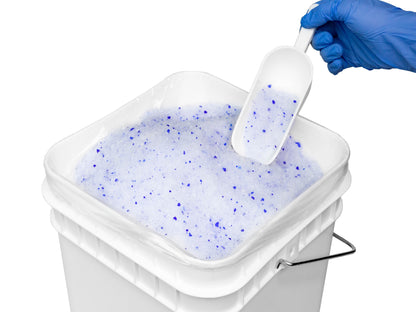 Heathrow Scientific sampling scoop collecting desiccant beads from a pail